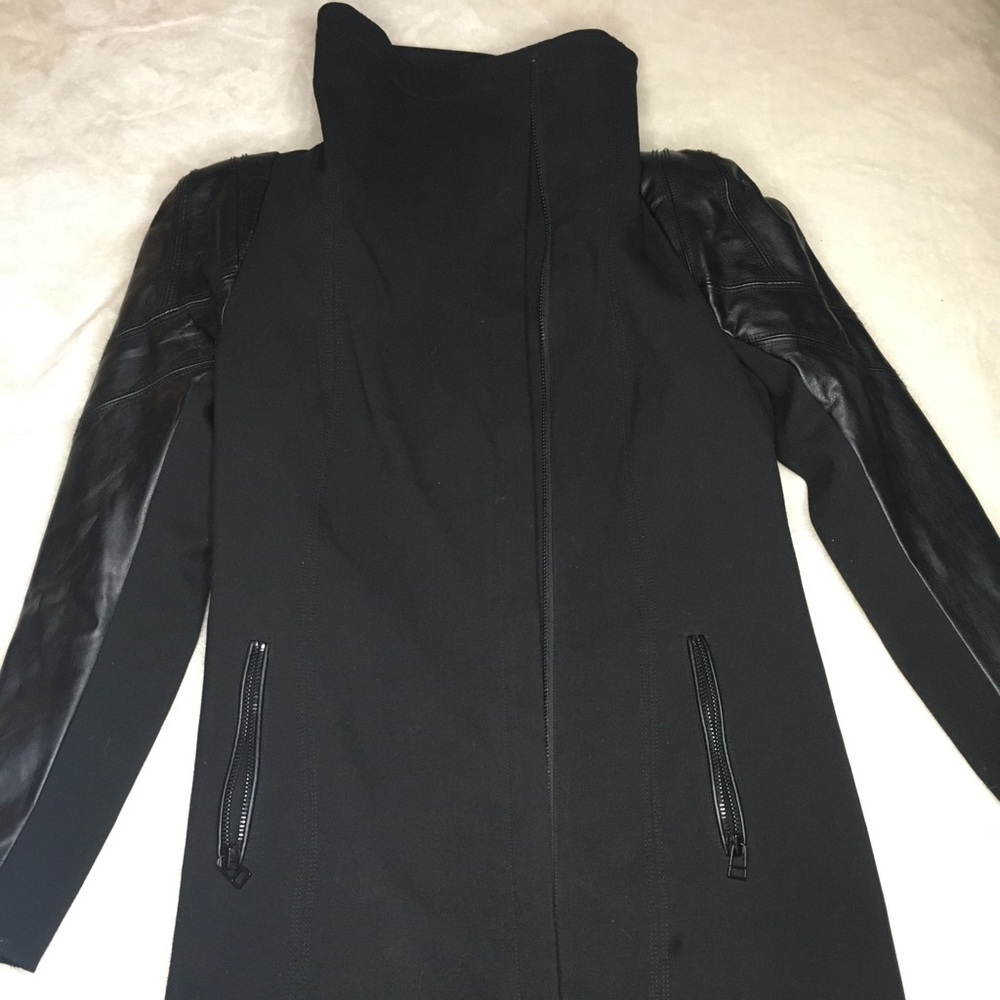 Gorgeous winter mid length faux leather coat